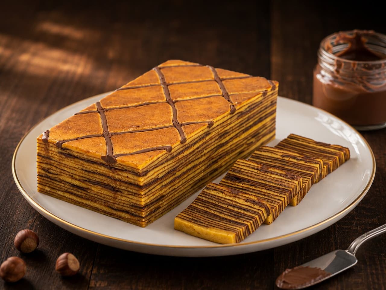 Lapis Nutella dengan olesan cokelat hazelnut yang creamy